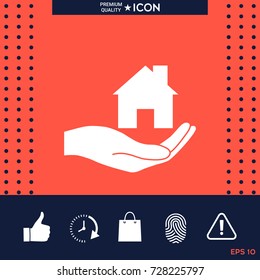 Hand holding home