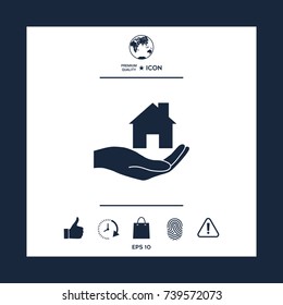 Hand holding home