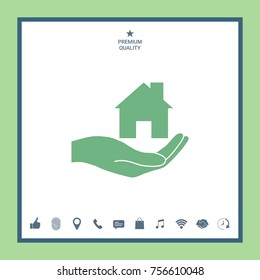 Hand holding home