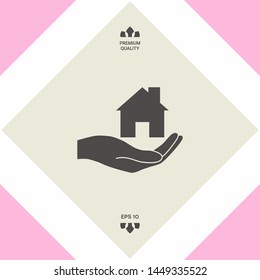 Hand holding home. Graphic elements for your design