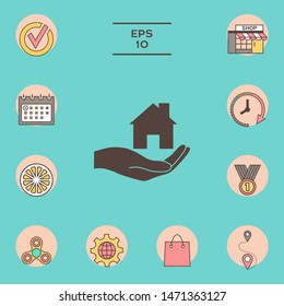 Hand holding home. Graphic elements for your design