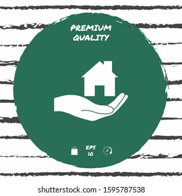 Hand holding home. Graphic elements for your design