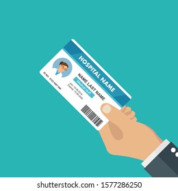 Hand holding the hospital id card. Vector illustration flat design.