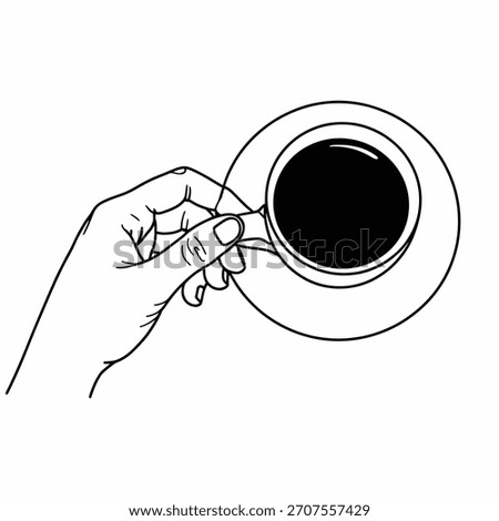 Hand holding a hot coffee cup viewed from above