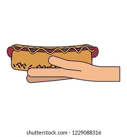 Hand holding hot dog