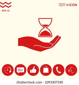 Hand holding Hourglass