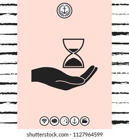 Hand holding Hourglass