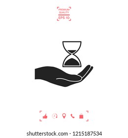 Hand holding Hourglass