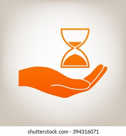 Hand holding Hourglass