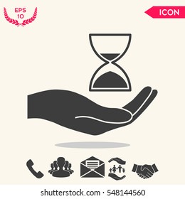 Hand holding Hourglass