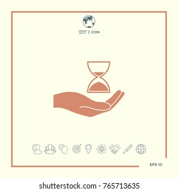 Hand holding Hourglass