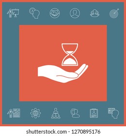 Hand holding Hourglass. Graphic elements for your design