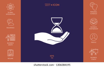 Hand holding Hourglass. Graphic elements for your design