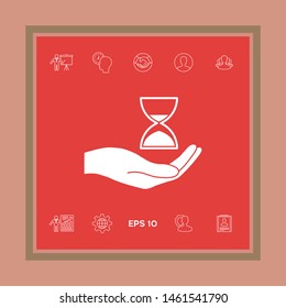 Hand holding Hourglass. Graphic elements for your design