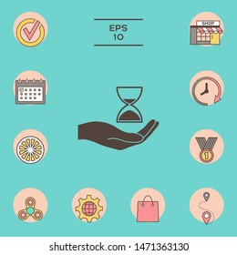 Hand holding Hourglass. Graphic elements for your design