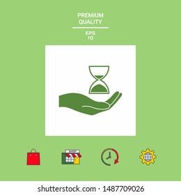 Hand holding Hourglass. Graphic elements for your design