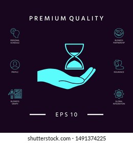 Hand holding Hourglass. Graphic elements for your design