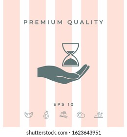 Hand holding Hourglass. Graphic elements for your design