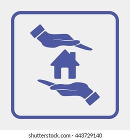Hand holding house.