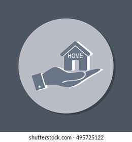 hand holding a House icon. Home sign