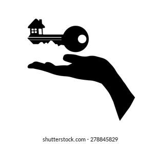 Hand holding a house key