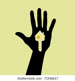 Hand holding a house key