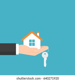 Hand Holding House And Key. Vector Image