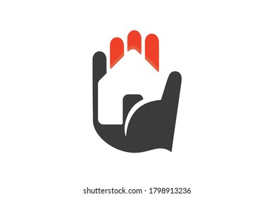 Hand holding house in negative space for real estates brands and logos