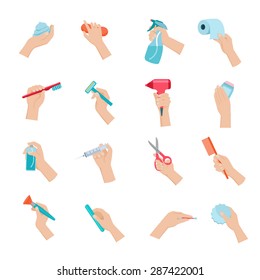 Hand holding household objects and hygiene accessories icons set flat isolated vector illustration 