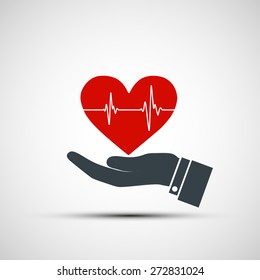 Hand holding a human heart. Vector image.