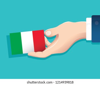 hand holding Italy flag card with blue background. vector illustration eps10