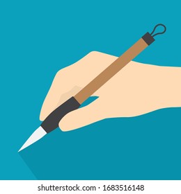 hand holding japanese writing brush -vector illustration