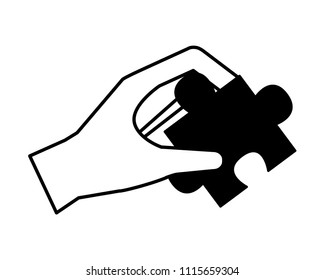 hand holding jigsaw puzzle piece work