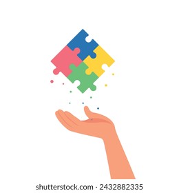 Hand holding jigsaw puzzle. Teamwork, cooperation, business solution concept.