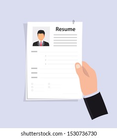 Hand holding Job application. CV papers. Human resources management concept, searching professional staff, analyzing resume papers, work. Selecting staff. Business resume.Searching professional staff