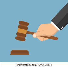 Hand holding judges gavel - Flat style