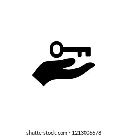 Hand holding up a key