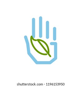 Hand holding a leaf.