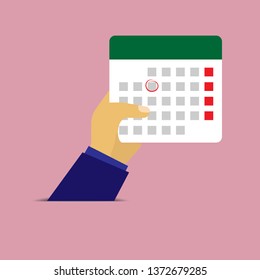 Hand holding a leaf of a calendar with the marked date flat design