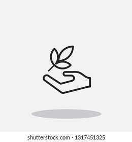 Hand holding leaf vector icon