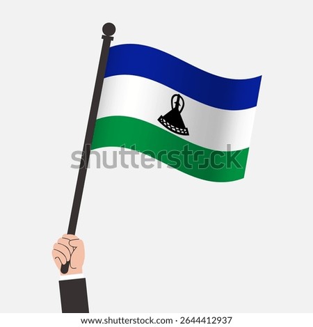 Hand Holding Lesotho Waving Flag