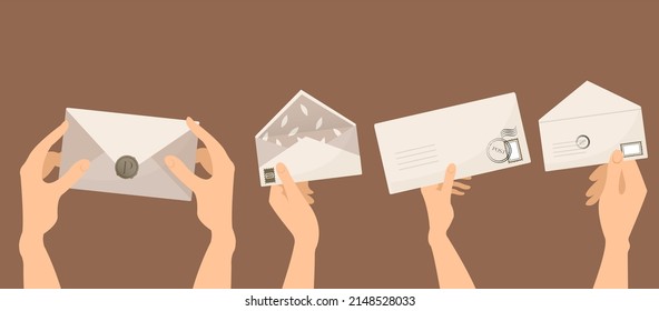 hand holding a letter envelope to send 