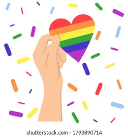 hand holding lgbt heart.LGBT flag. Rainbow love concept.vector lgbt lesbian gay pride trans poster card banner with love is love.Heart with six rainbow stripes.Homosexual love emblem.pride day happy.