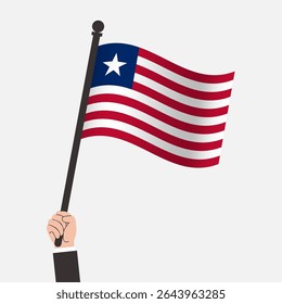 Hand Holding Liberia Waving Flag
