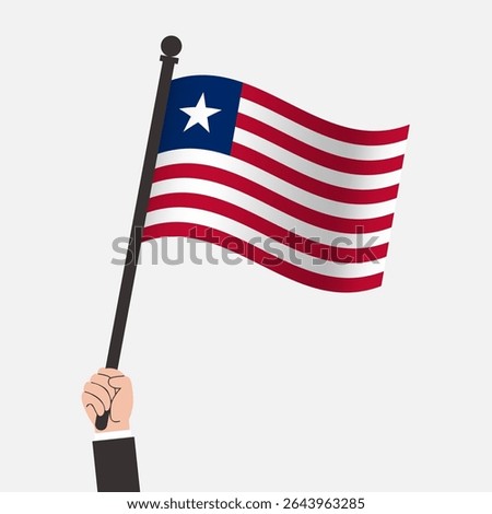 Hand Holding Liberia Waving Flag
