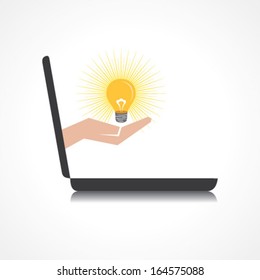 hand holding light bulb comes from laptop screen stock vector