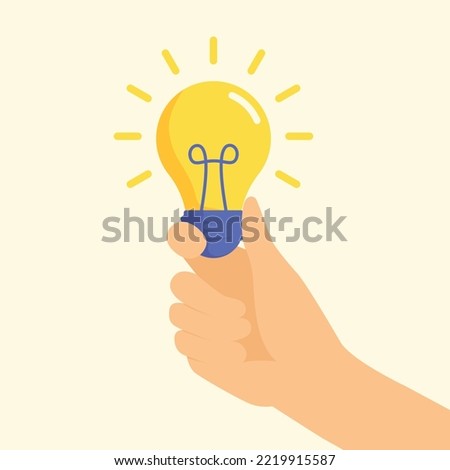 Hand holding light bulb. Creative concept of business idea, solution, innovation, or inspiration.