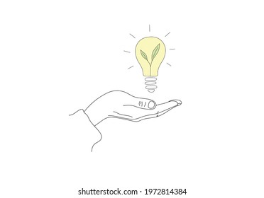 Hand Holding a Light Bulb with Eco Sprout Inside. Green Ecology Life Concept.