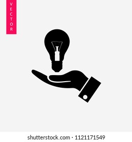 Hand holding light bulb icon