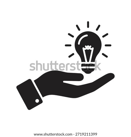 Hand holding light bulb open palm solid black vector icon isolated white background presenting idea sharing solution symbol graphic design illustration